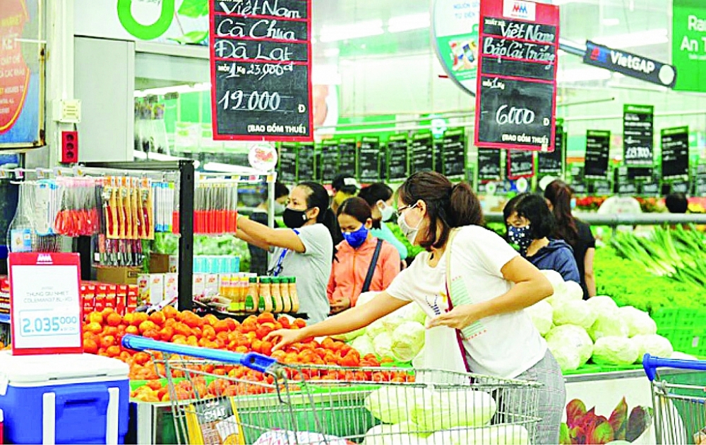 Kiểm soát lạm phát an toàn chính phủ đang đẩy mạnh kích cầu tiêu dùng nhằm hỗ trợ tăng trưởng kinh tế. Ảnh: ST